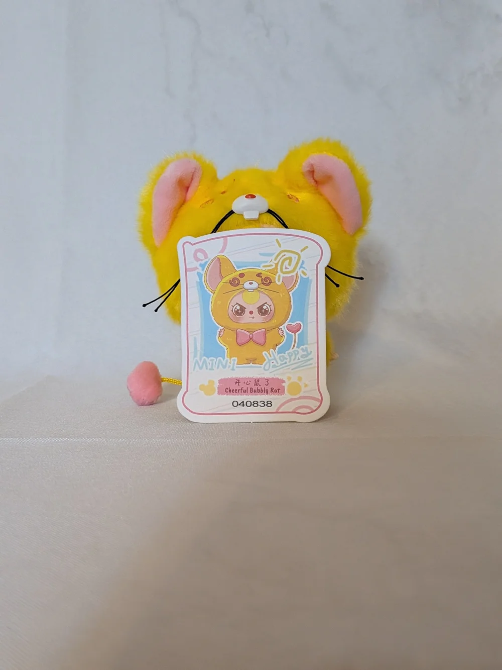 Plush Yellow & Pink Small Pet Toy — Soft Decorative Companion